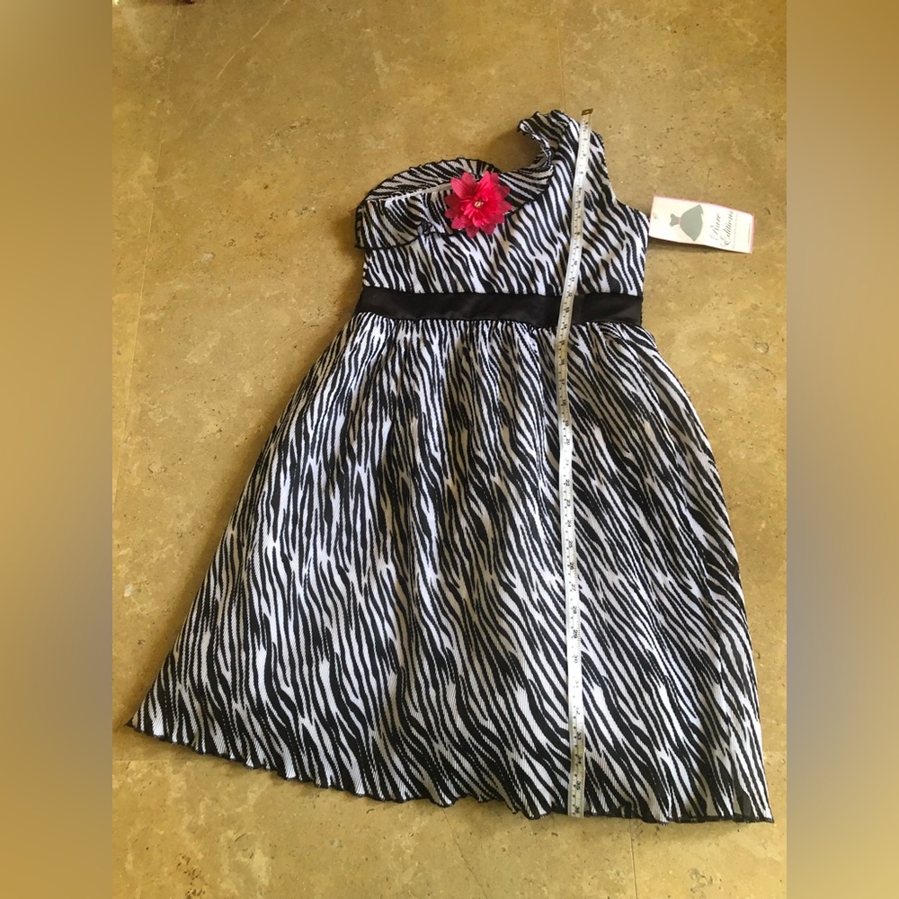 Dress has a satin lining and some tule at the bottom.